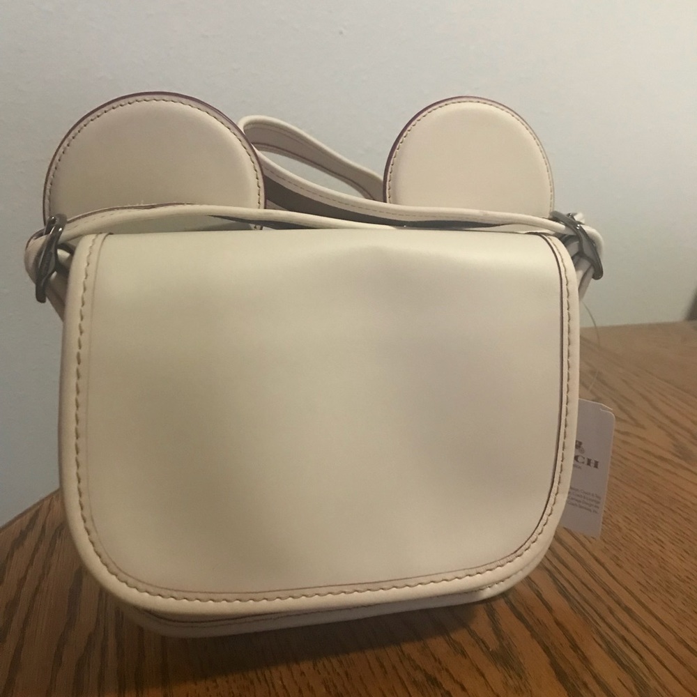 NWT Disney coach crossbody Patricia Saddle